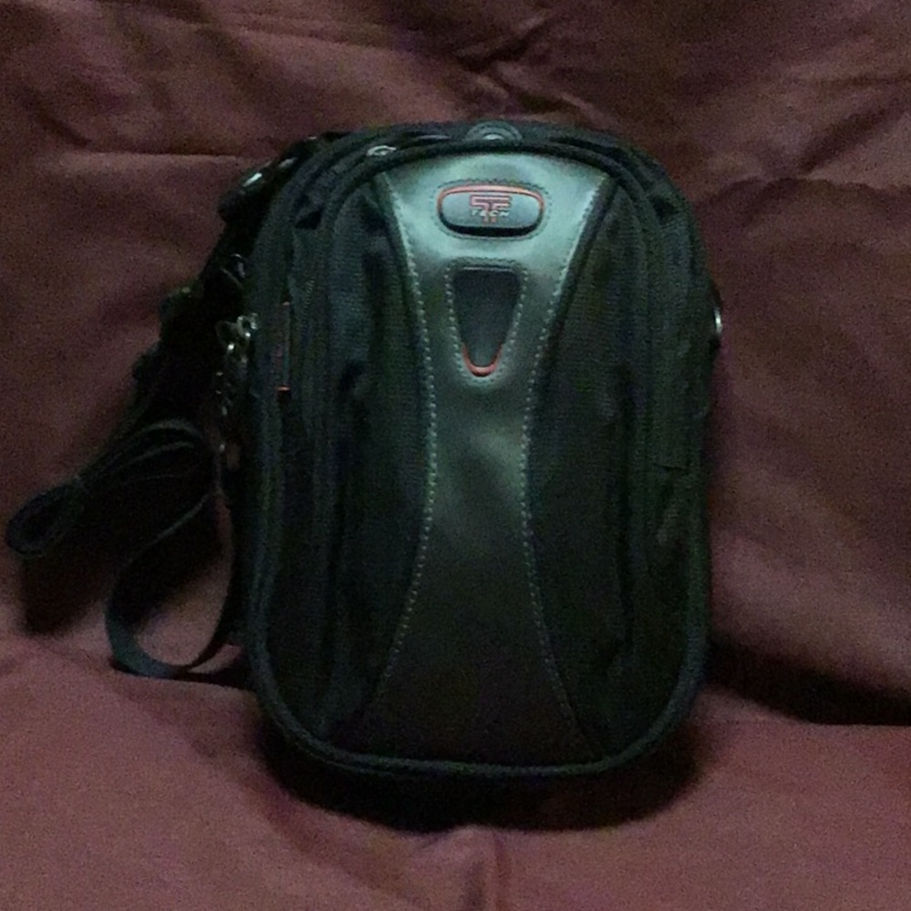 Tumi crossbody travel purse